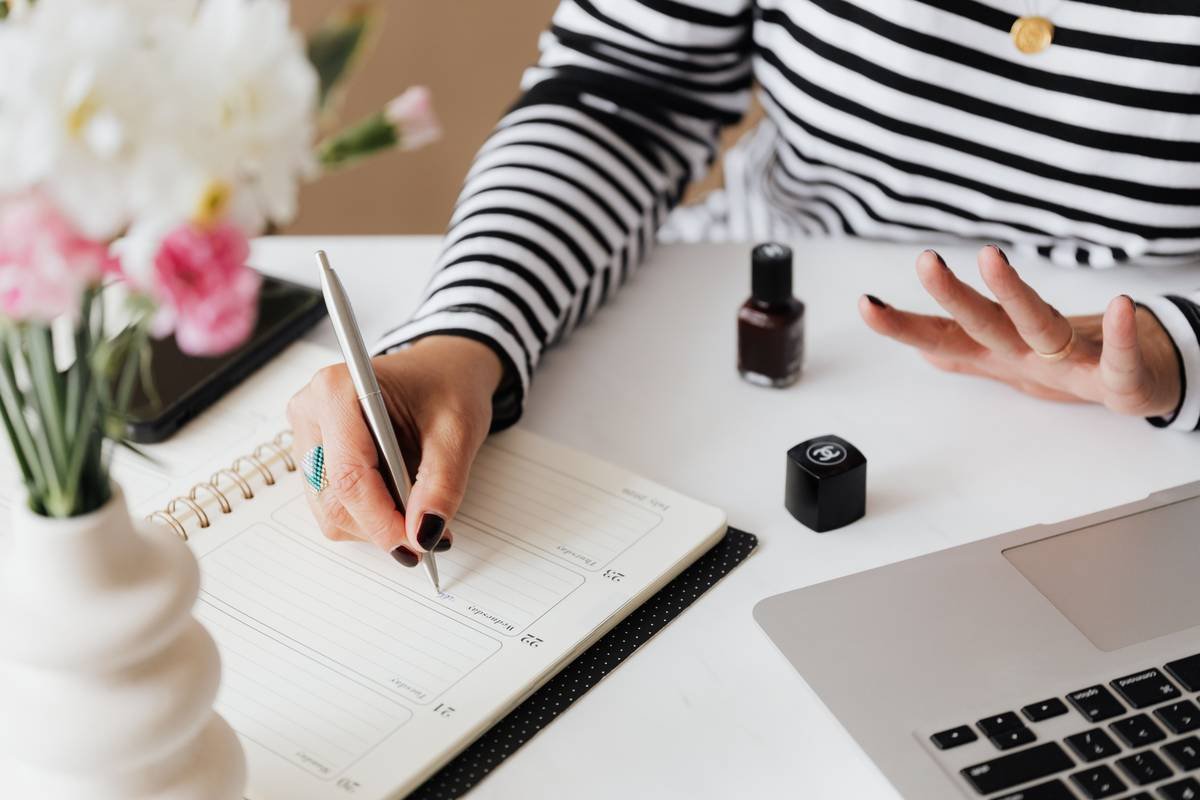 Side-by-side comparison showing traditional nail polish brush smudging cuticles vs. manicure pen creating crisp French tip line